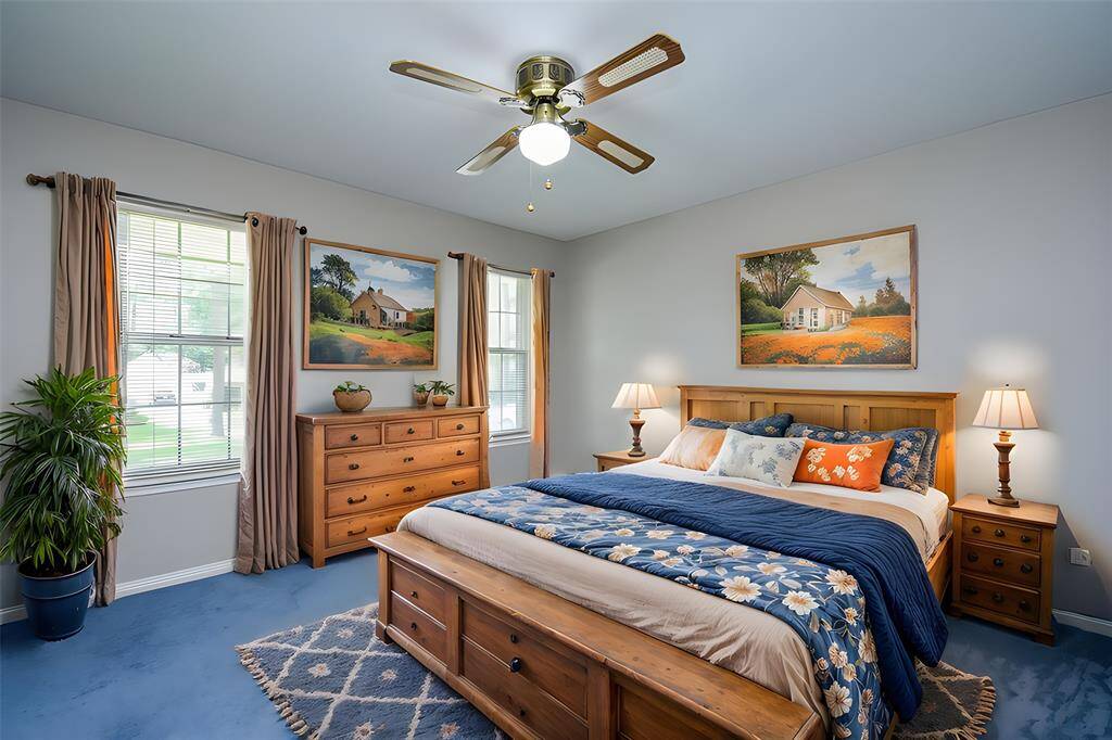 A Virtually Staged Secondary Bedroom welcomes great natural light and space, galore, for bedroom pieces and accents.