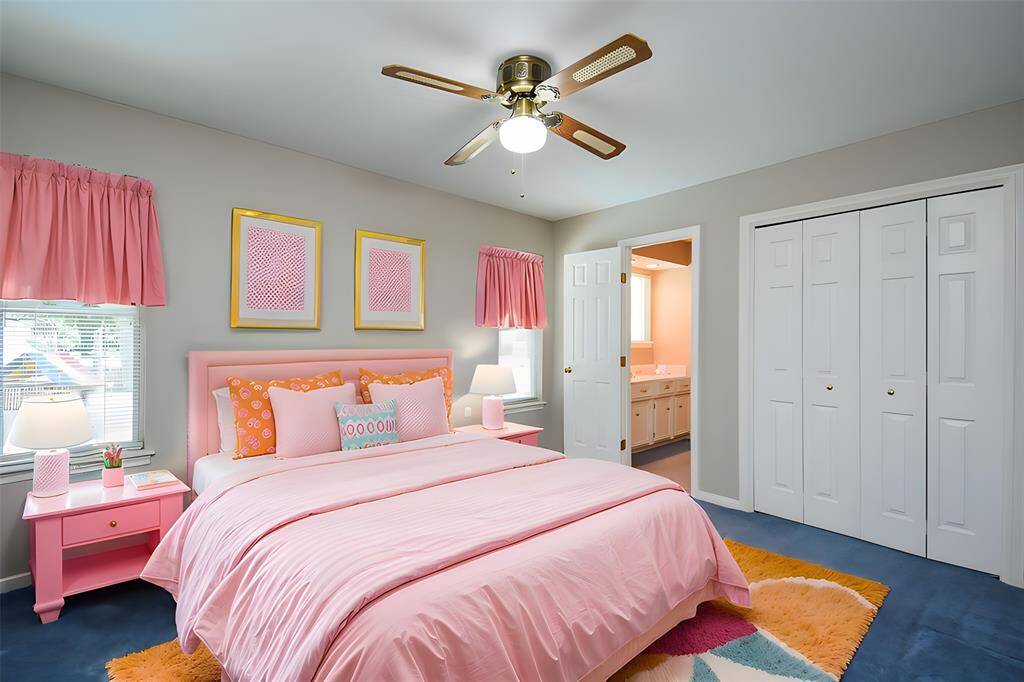 A Virtually Staged Secondary Bedroom offers the comforts with its own ensuite bath.