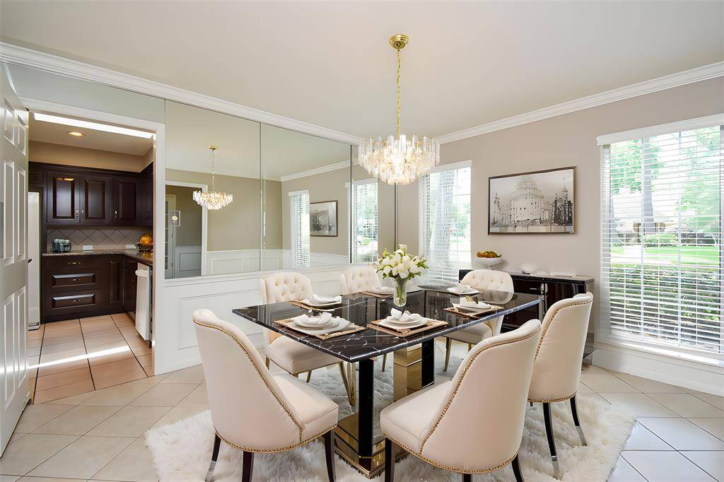 This Virtually Staged Formal Dining area gives you an accurate view of how your treasures will fit in a naturally lit, and mirrored wall space.
