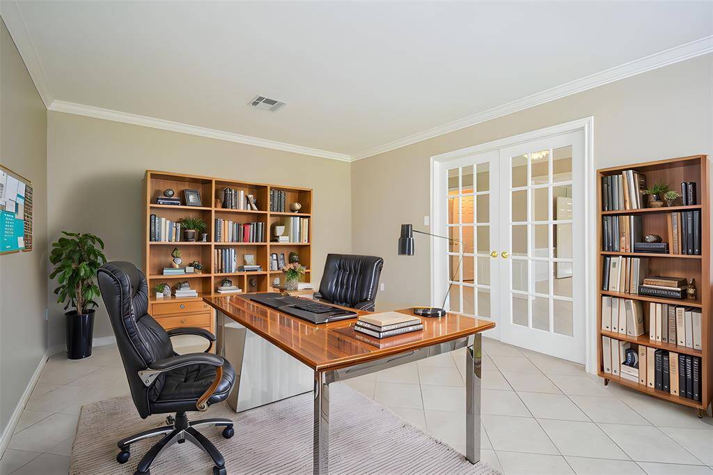 Once again, this Virtually Staged front room office, with classic french doors, provides a realistic rendition of what this precious space can look like, with your additions!