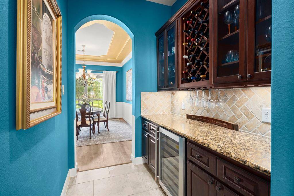 Elegant formal dining with direct access to butler’s pantry.