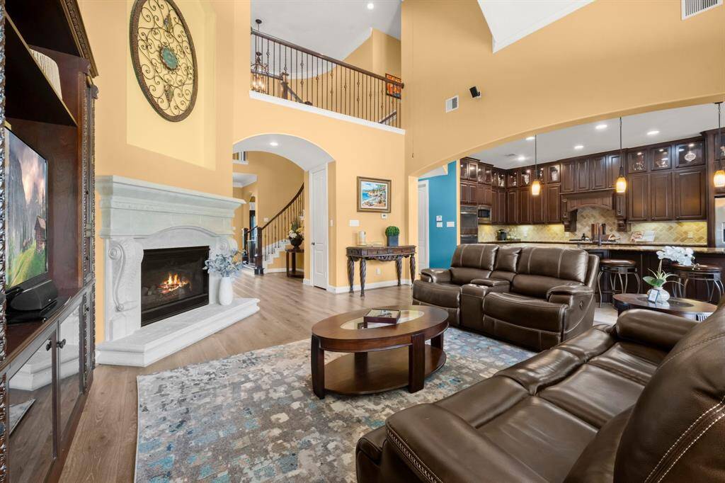 Seamlessly flows to kitchen and foyer for effortless entertaining.