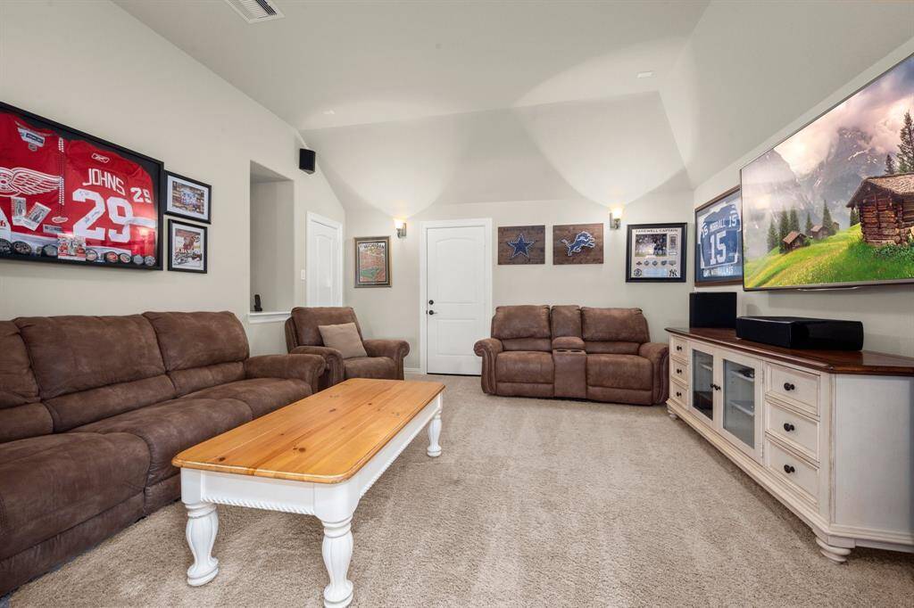 Media room comes equipped with TV—movie nights await!