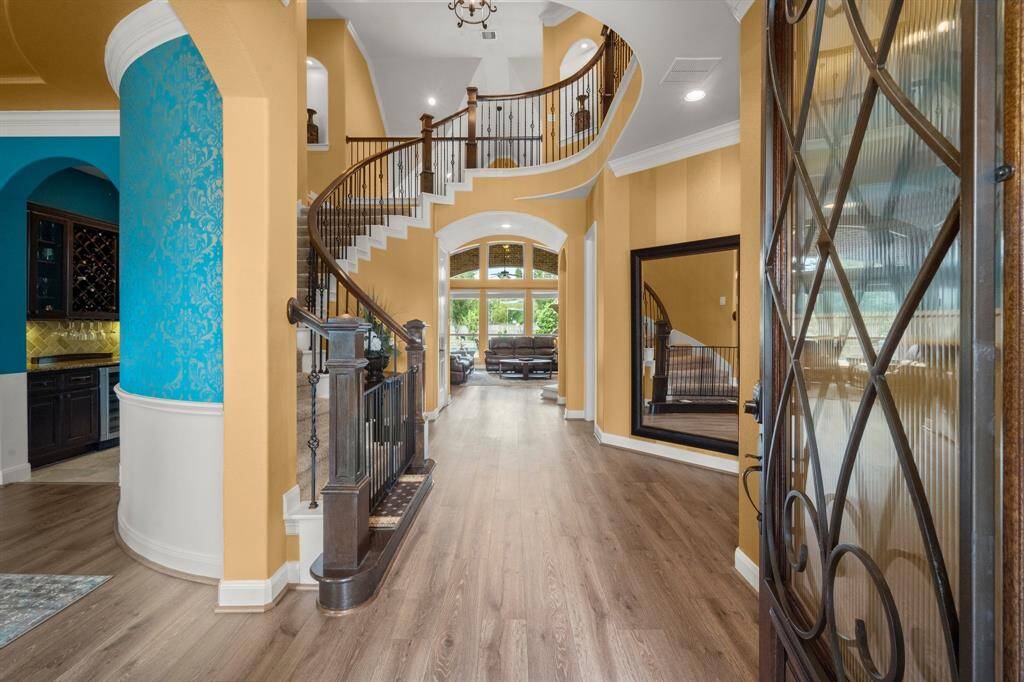 Eye-catching architectural lines and elegant finishes greet you at the door.