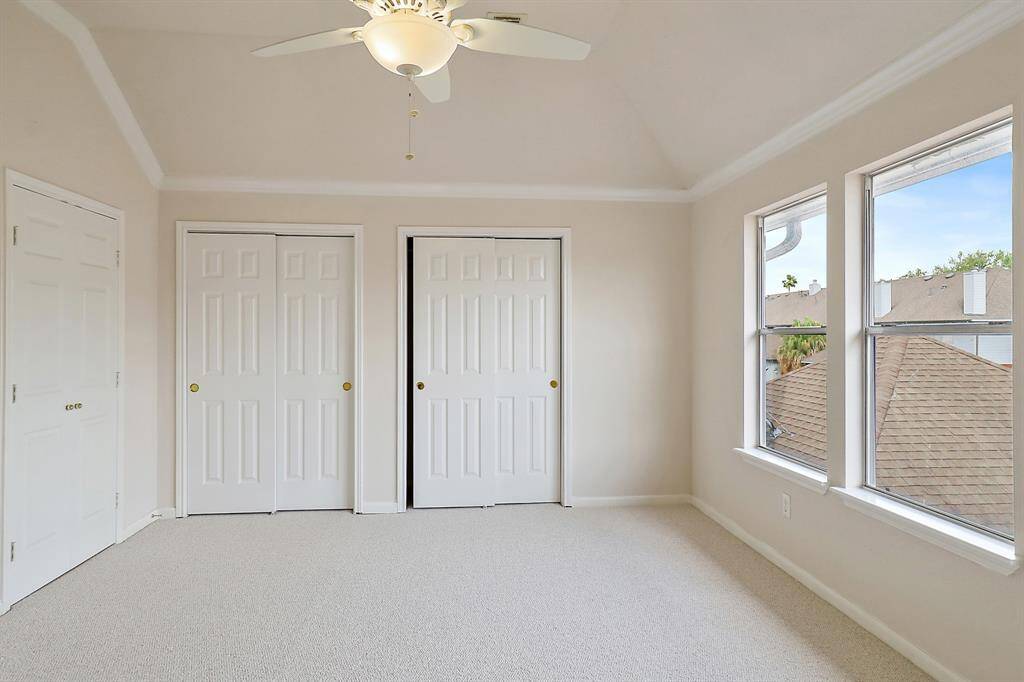 Bright and spacious upstairs primary bedroom with ample closet space.