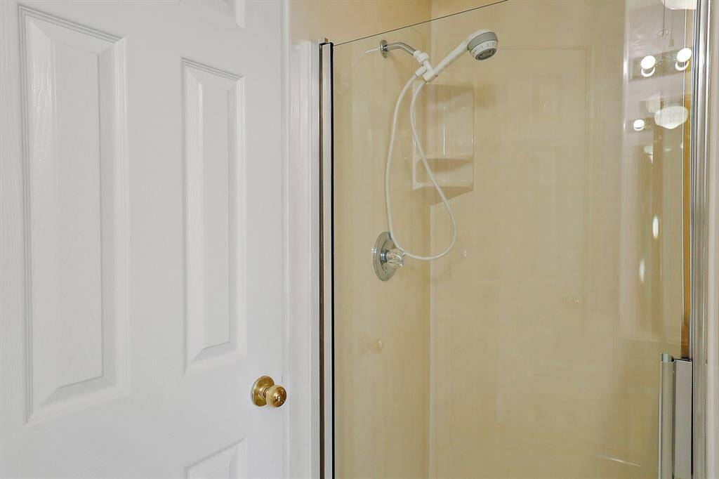 Experience the convenience of a separate shower in the primary bathroom.