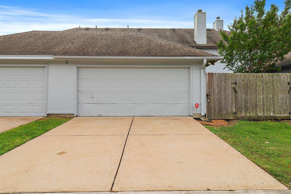 Spacious attached garage for convenient parking and storage.
