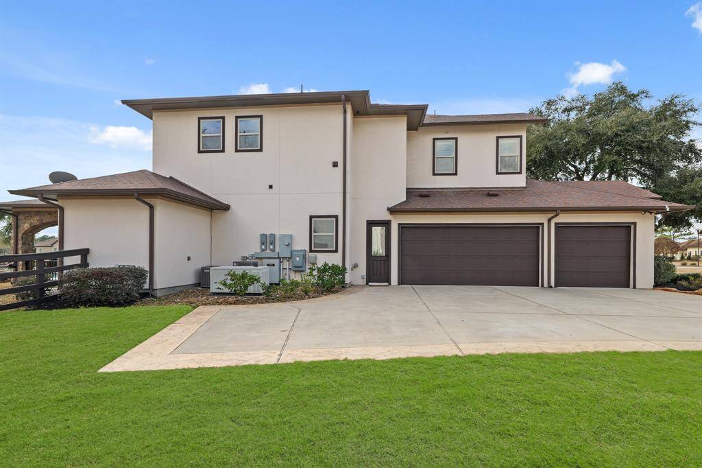 Additional standout features include an oversized 3-car garage, a whole house generator, and a water softener system for improved quality.