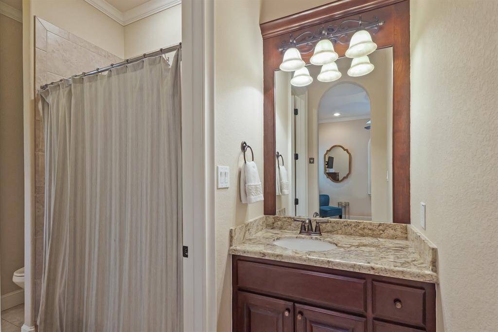 Functional Jack & Jill Bathroom is separated by a door leading to the shared space. This Bathroom also features a separate bathtub & toilet room offering privacy & convenience.