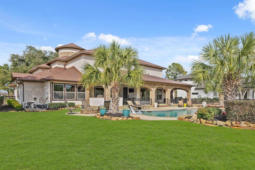 This backyard is a true haven, offering everything you need to live the ultimate outdoor lifestyle. Fenced 1.18 ac lot.
