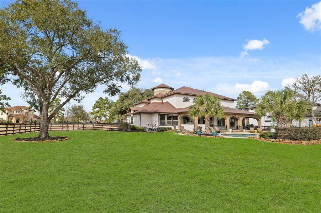 Enjoy sunny afternoons by the sparkling Pool, unwind in the Luxurious Spa, or host family gatherings under the Covered Patio. Sprinkler system covers entire backyard.
