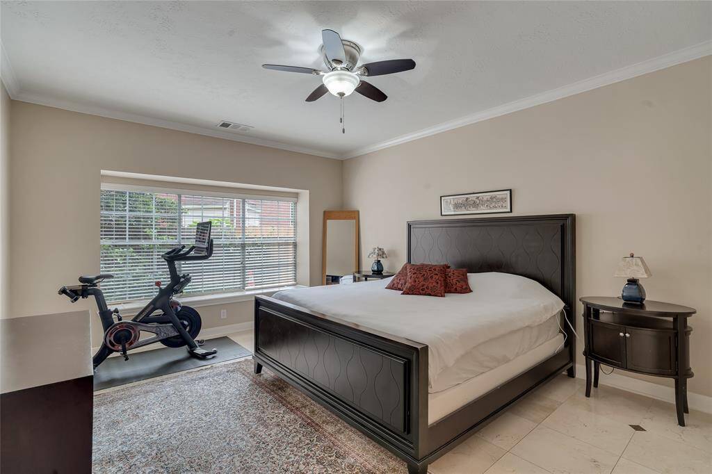 Privacy and relaxation can be yours in this primary suite with a large picture window overlooking the backyard.