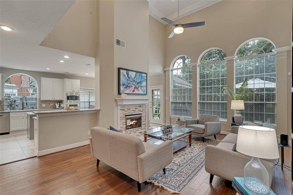 The living room is open to the kitchen and breakfast room, great for entertaining.