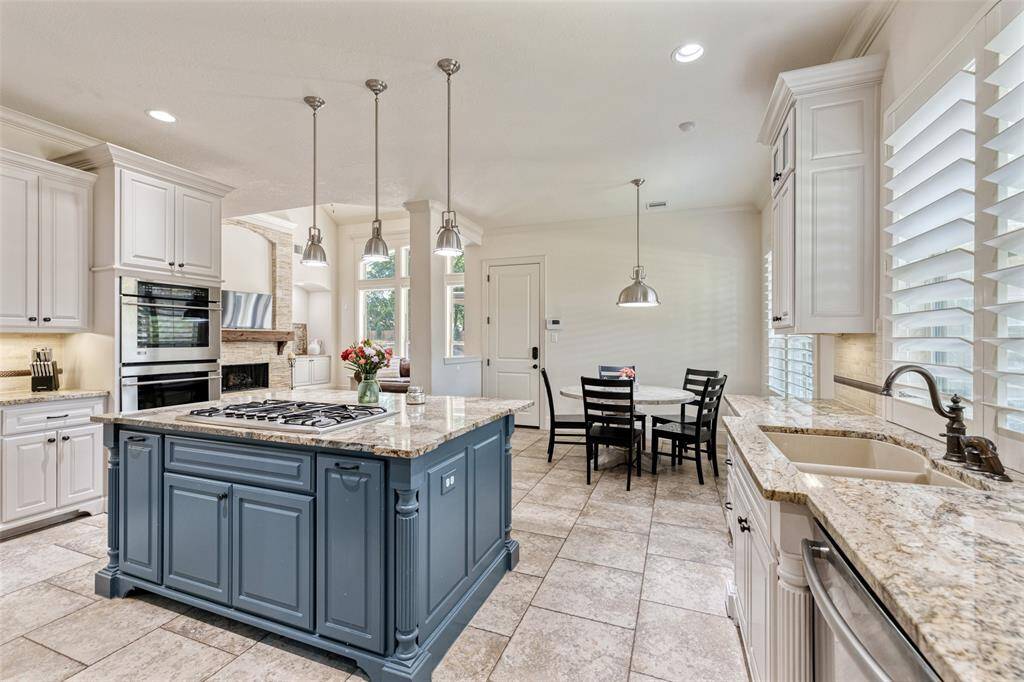 Kitchen is open to the breakfast nook area.