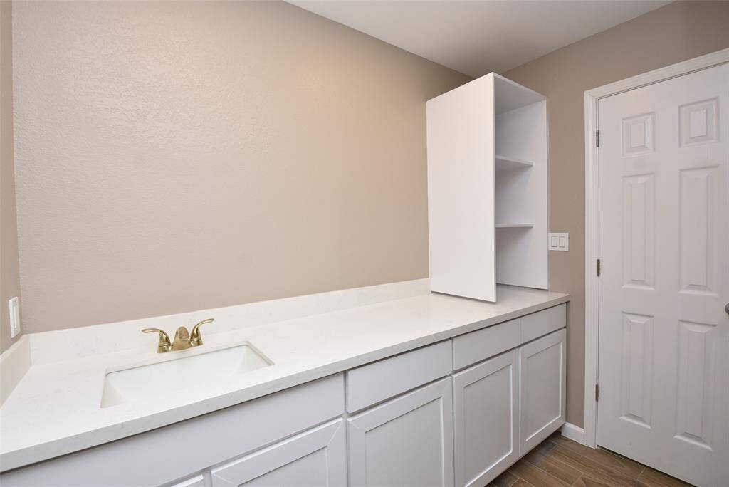 Plenty of counter space in the primary bathroom!