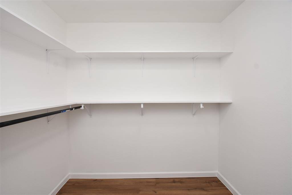 Gorgeous walk-in closet in the primary bedroom!