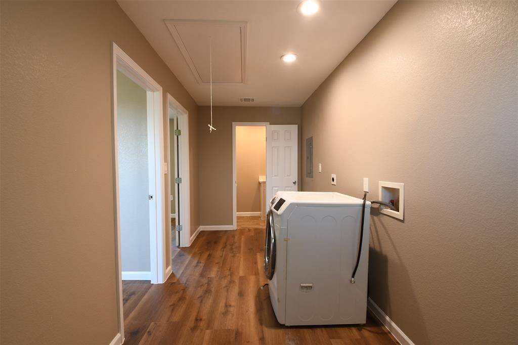 Washer and dryer connections in the hallway right outside of bedroom #2 & #3!