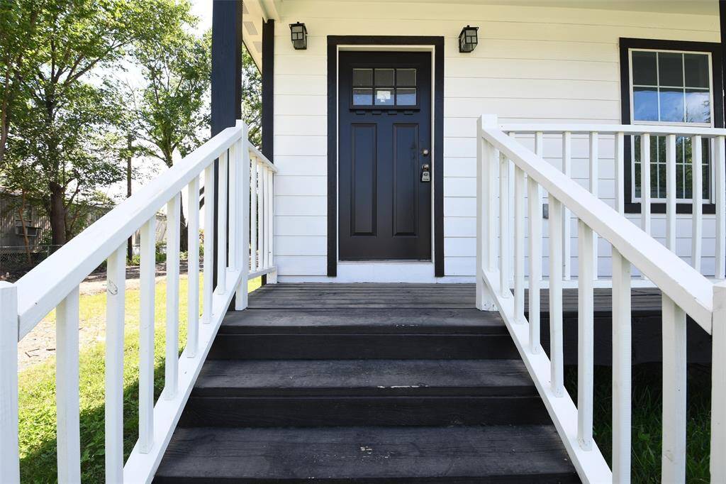 Stairs leading up to the fully renovated 3 bedroom/3.5 bathroom manufactured home!
