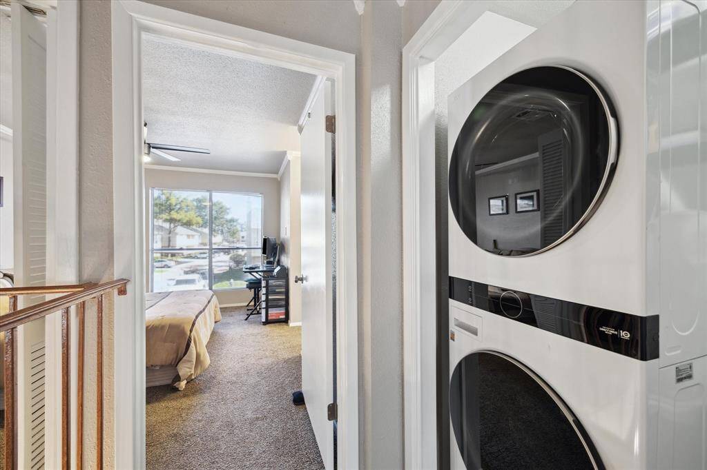 The laundry room is on the second floor and has new full-size stackable washer and dryer included with the home!