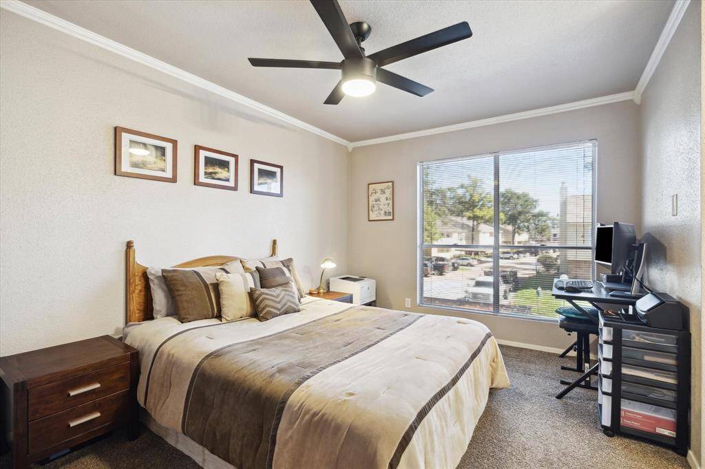 The secondary bedroom is very spacious with huge windows and lots of light. There is an ensuite bathroom in the secondary bedroom as well.