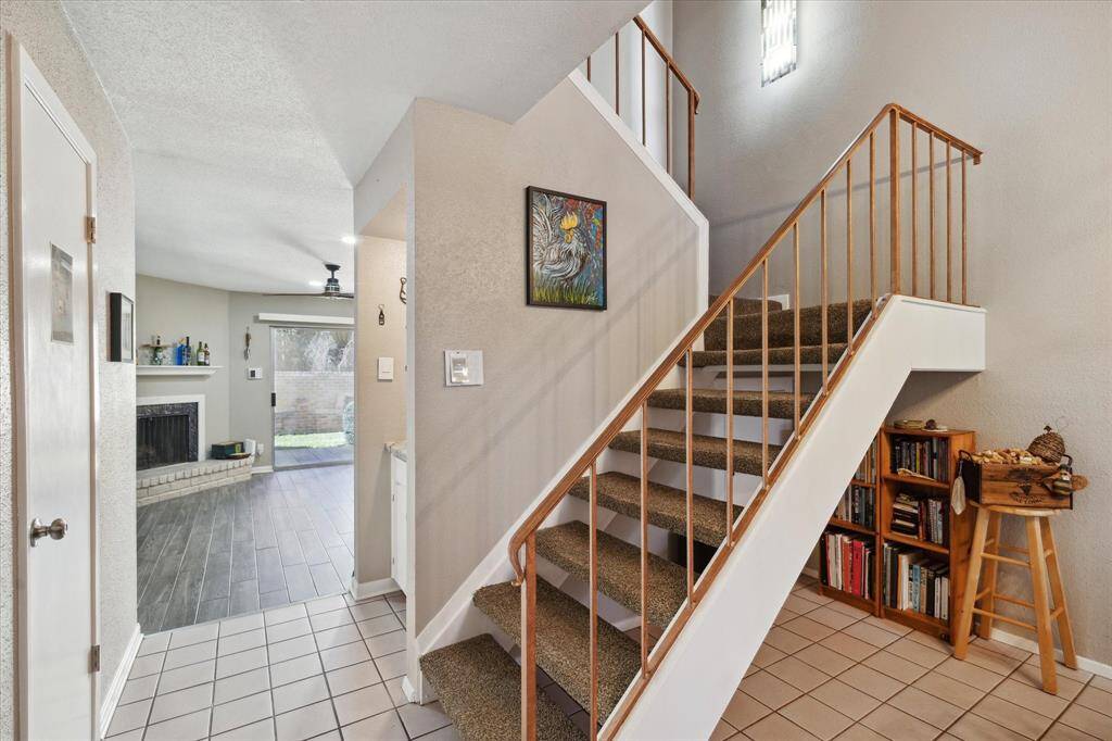 You’re open staircase, has been freshly updated and painted.