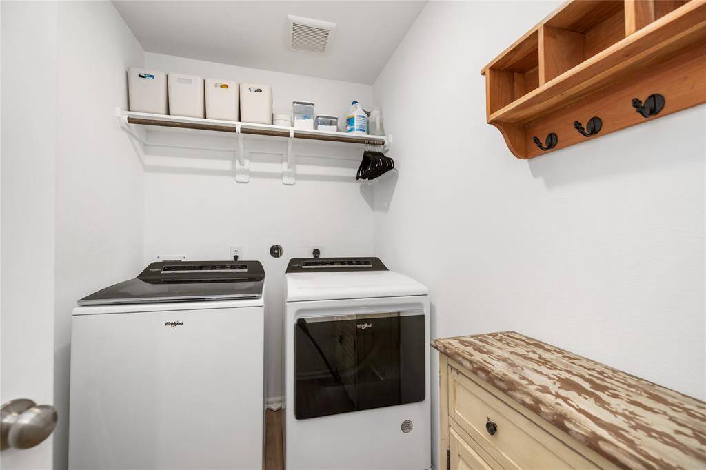 Laundry room with built-in cubbies, perfect for organization and everyday ease..