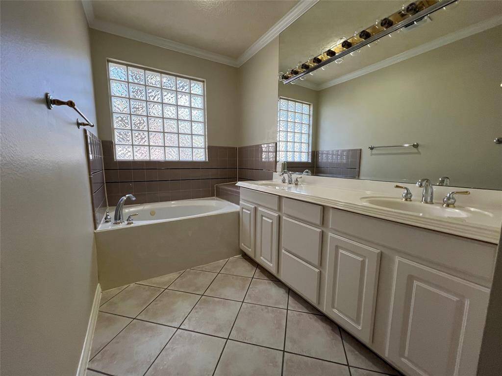 Double sink vanity in primary bath.