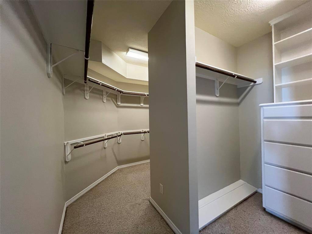 Large walk in closet in primary bedroom.