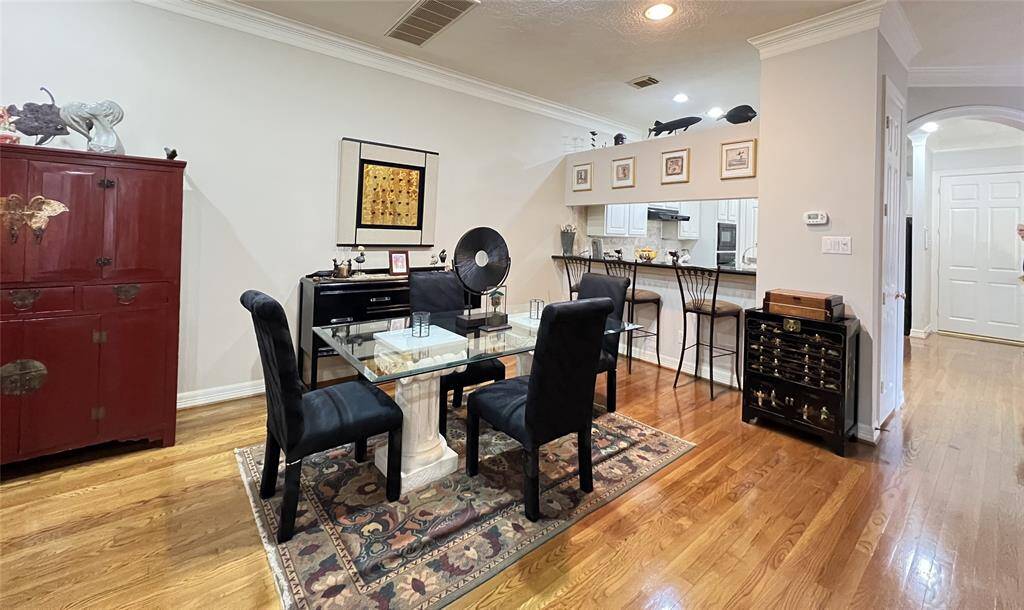Dining room open to family room, perfect for entertaining.