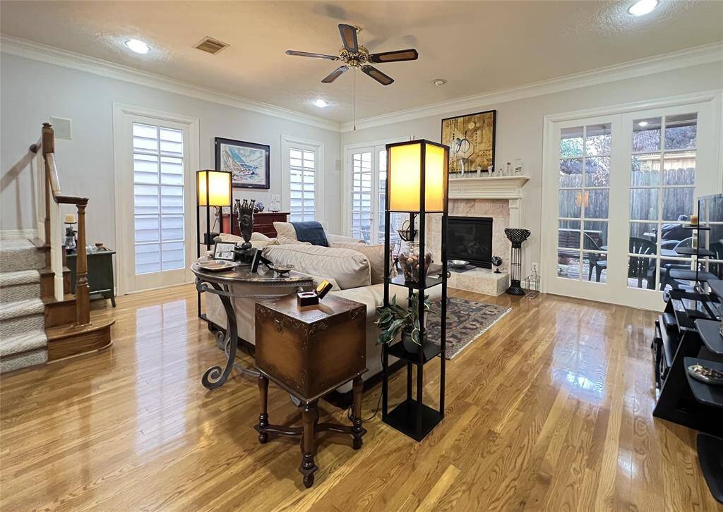 French doors and a lot of windows brighten up the family room.