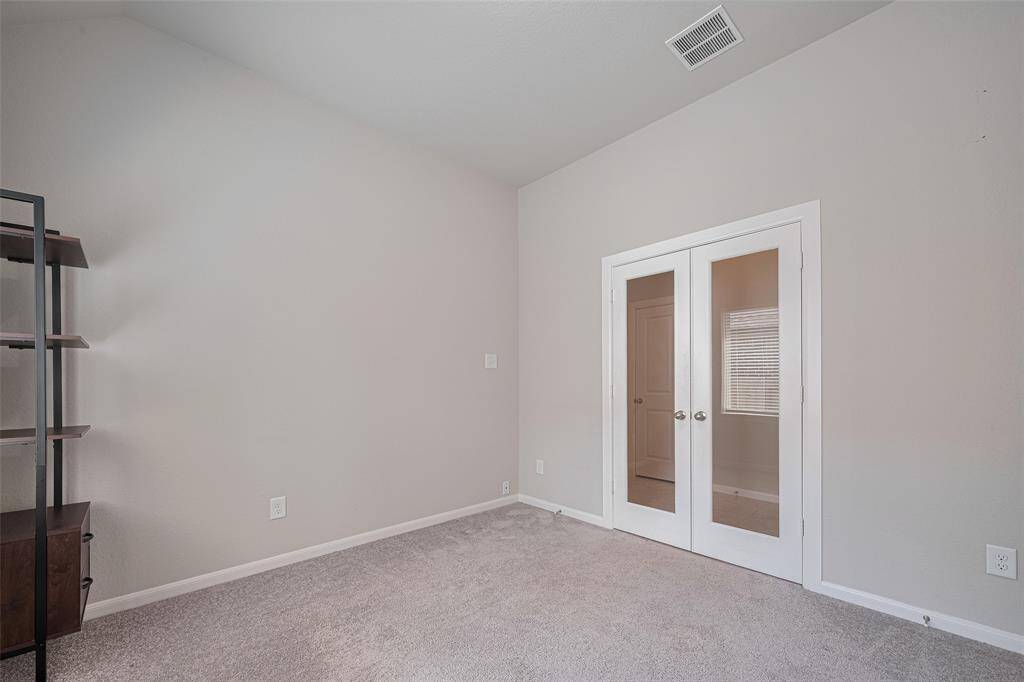 Study with French doors located off of entry way.