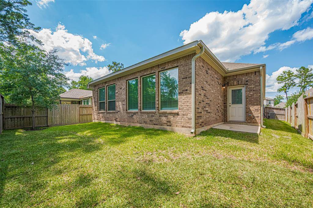 Backyard with NO BACK NEIGHBORS has been recently refreshed, doubling the size while still keeping it low maintenance.