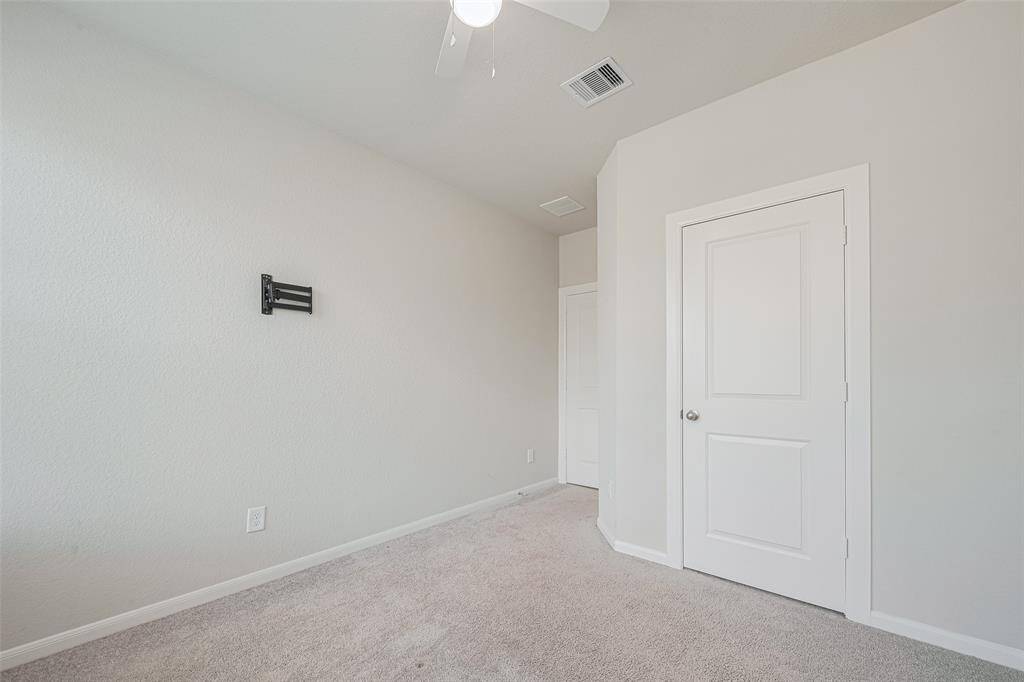 Another view of bedroom 2 with walk in closet.