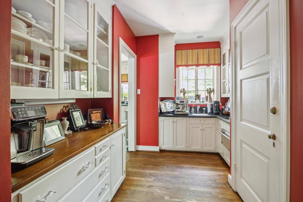 The butler's pantry with great storage opens to the catering kitchen.