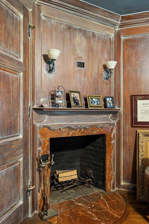 There is a handsome library study approximately 14' x 12' with wood burning fireplace.