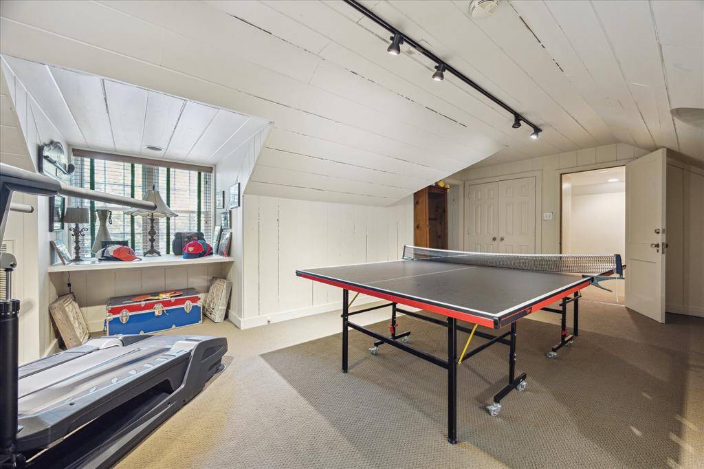 The third floor game room or 5th bedroom is approximately 20' x 15' with ensuite bathroom.