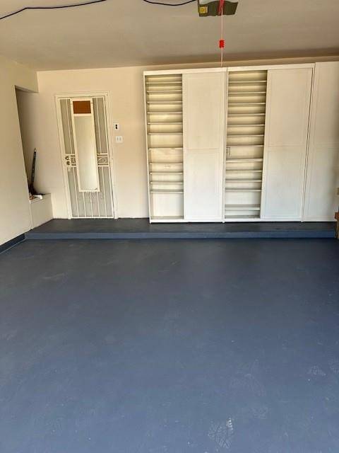 Garage with Custom Shoes closet pic 1