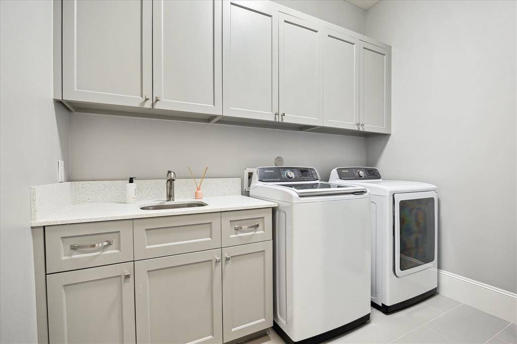 Laundry Utility Room, located near the Primary Bedroom.