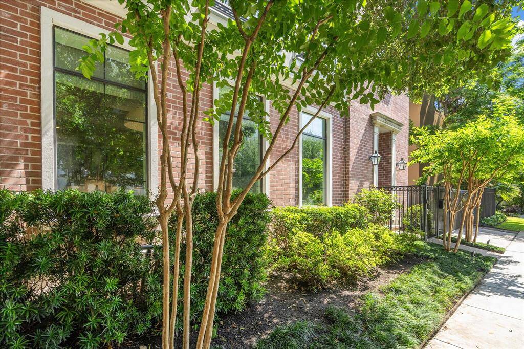 Beautiful lush landscaping at the front of the home.