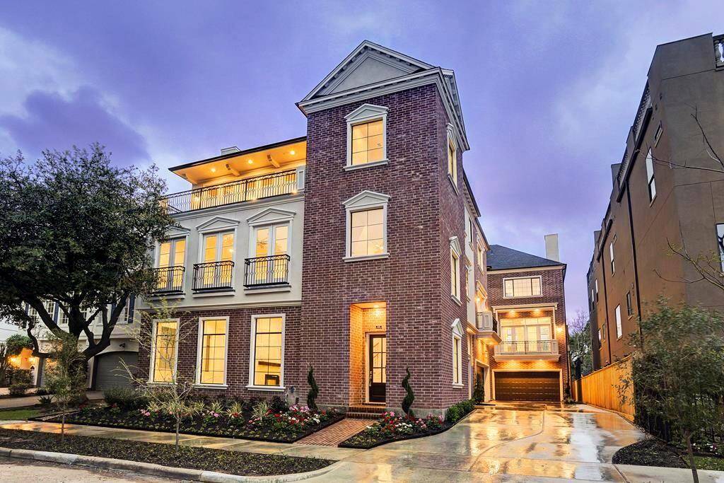 Dusk photo from a couple years back of the exterior of this amazing home.