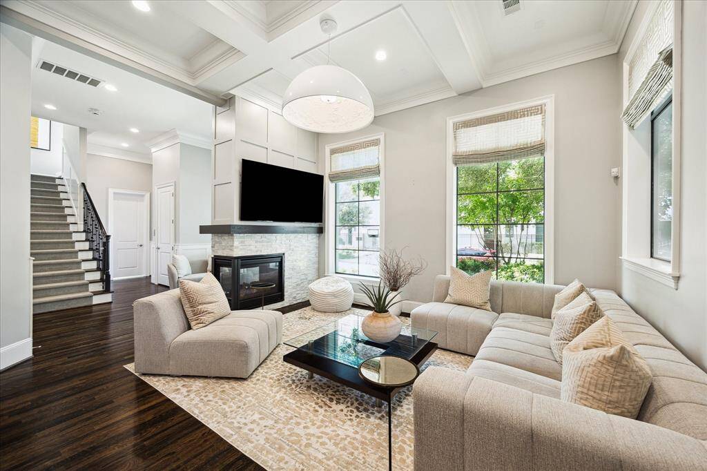 Living Room.  Open and stylish.  Approx 12 foot ceiling height.