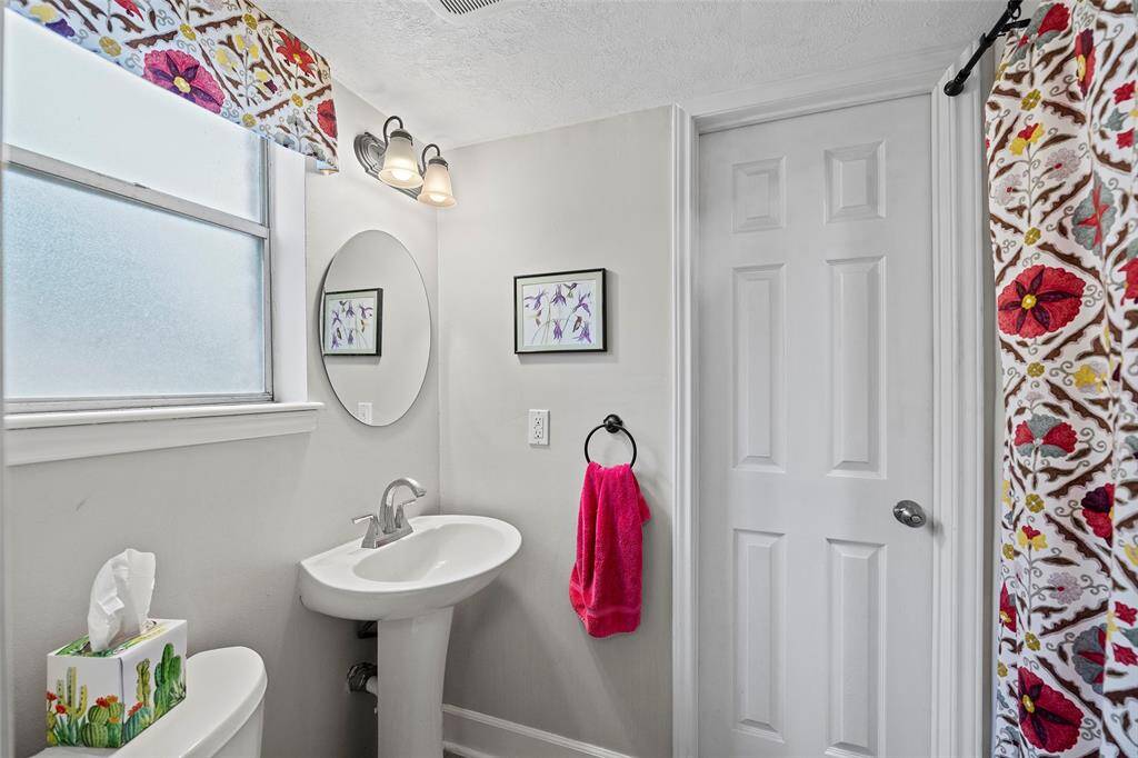 This full bath room is just off the flex room downstairs.