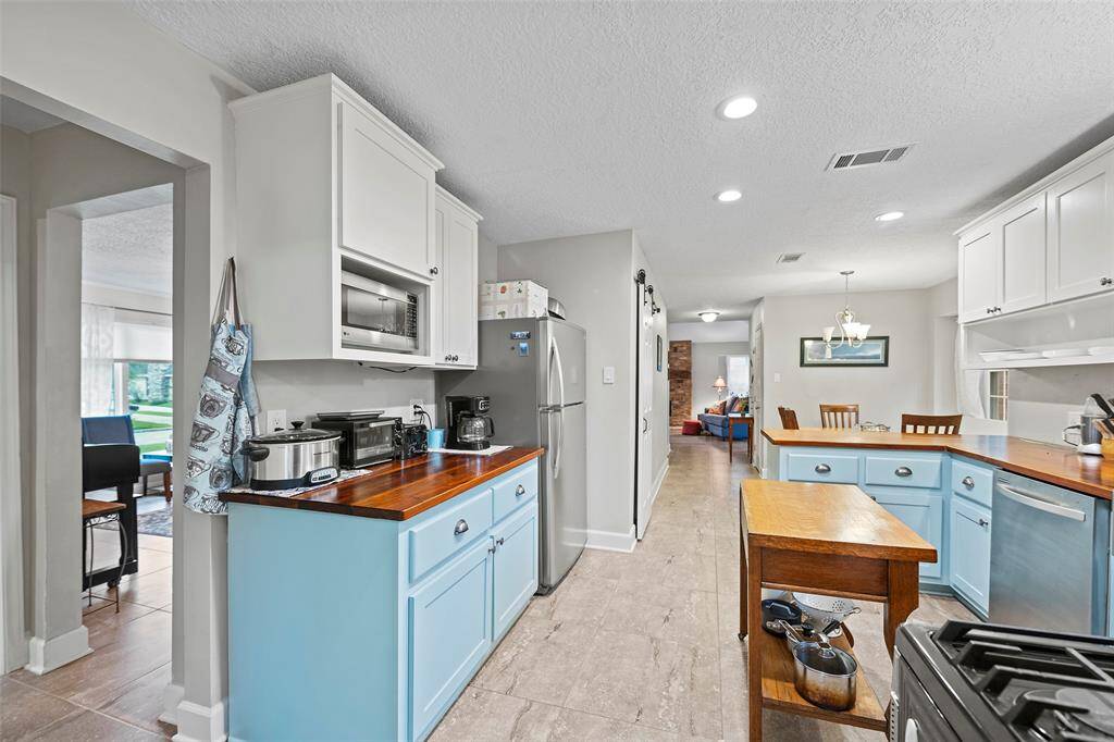 Easy access to both the breakfast room and formal at the front of the home.