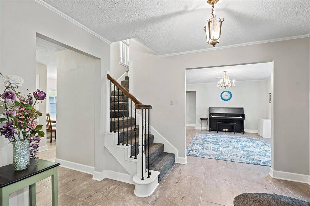 Another look to orient you in the foyer. Let's take a look upstairs.