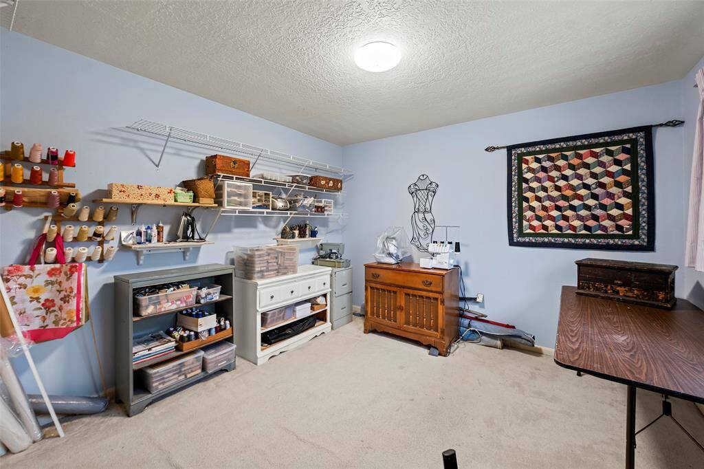 Secondary bedroom at the top of the stairs is currently a craft room - plenty of room!