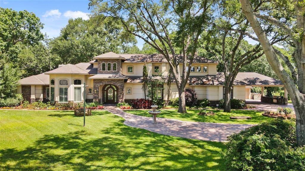 A rare, exceptional estate 2.4 beautifully landscaped acres. This private retreat features a meticulously designed main residence, private fully appointed 1,800 sq ft guest house, luxurious cabana for entertaining, spacious workshop/storage building, and resort style pool & hot tub.