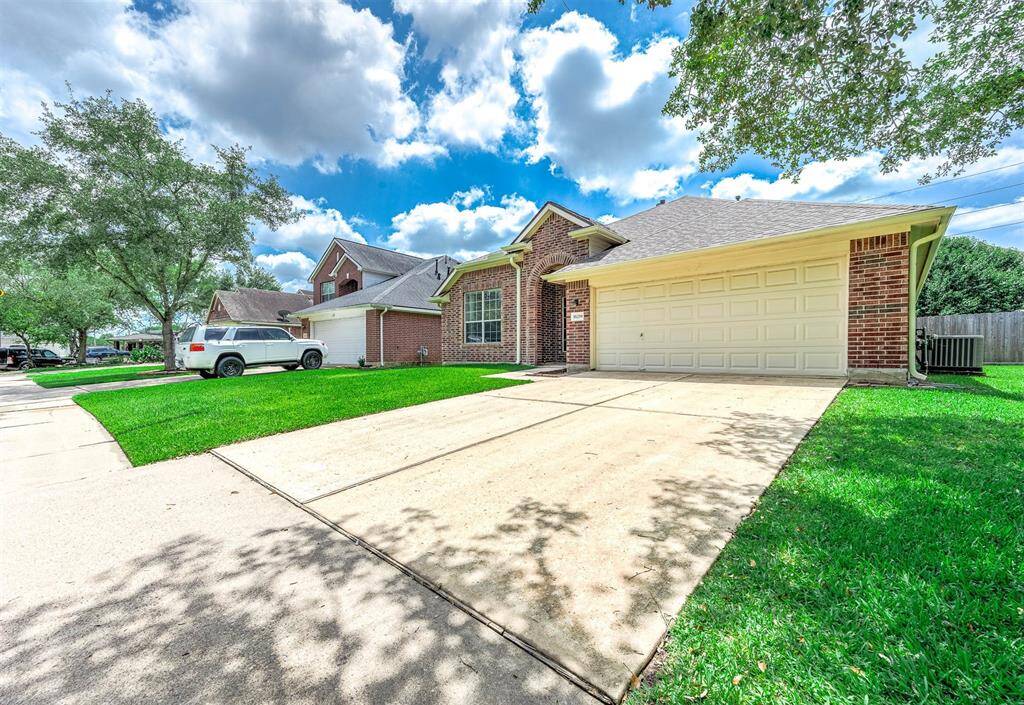 Spacious two-car driveway offers plenty of room for parking!