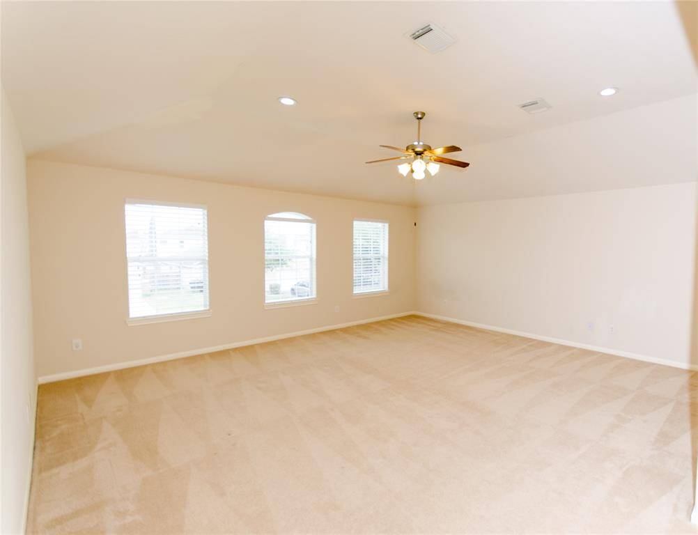 Upstairs game room overlooking the front of the house. It's a great space that can be a man cave, kids playroom, or a second living area.