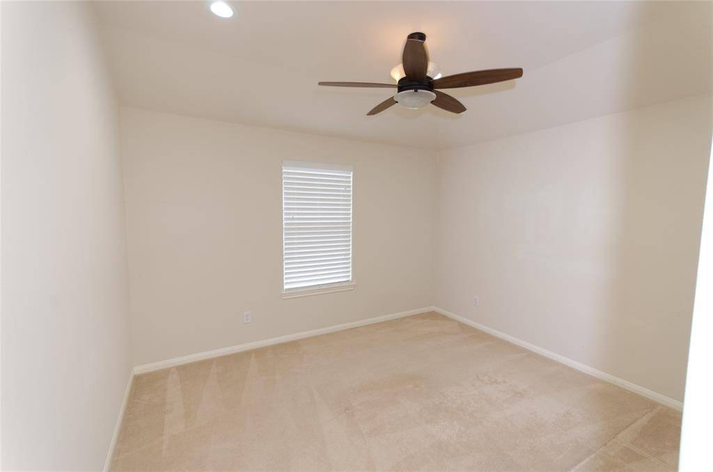 Bedroom #2, close the the game room. There is a walk in closet.