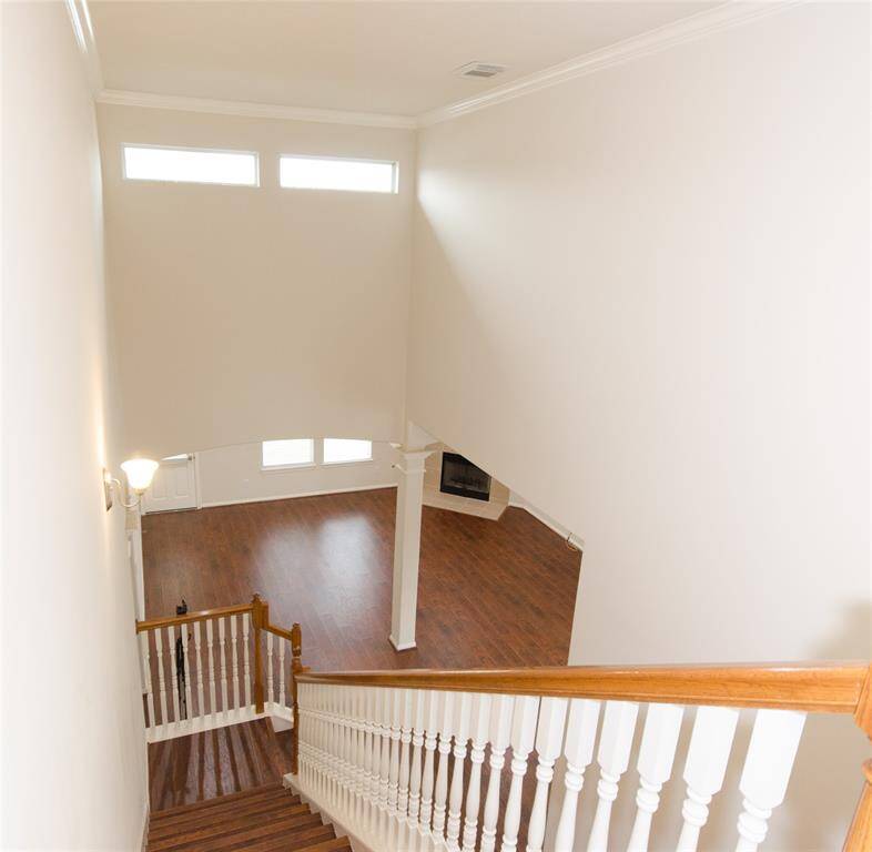 A view looking down the stairs. There is so much light in this house!